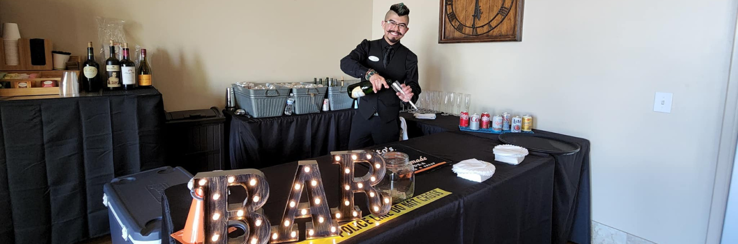Bar set-up with bartender pouring a drink
